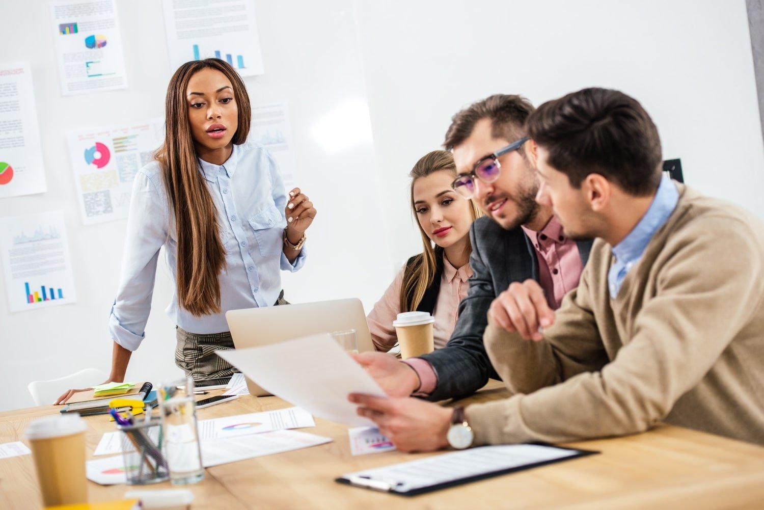 multicultural-group-of-marketing-managers-working-on-project-together-in-office-min.jpg